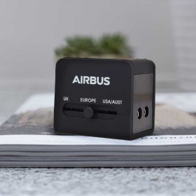 Universal travel adapter with USB connectors
